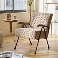 Poltrona con schienale alto e braccioli, design ad ali e base a X in metallo