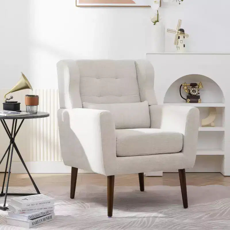 Poltroncina in ciniglia con schienale ergonomico, gambe affusolate in legno e cuscino decorativo, capacità 125 kg