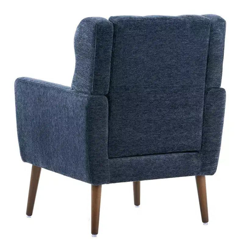 Poltroncina in ciniglia con schienale ergonomico, gambe affusolate in legno e cuscino decorativo, capacità 125 kg