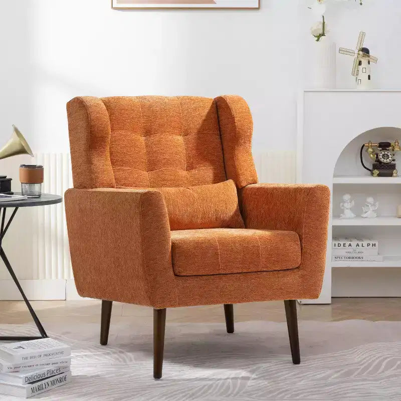 Poltroncina in ciniglia con schienale ergonomico, gambe affusolate in legno e cuscino decorativo, capacità 125 kg