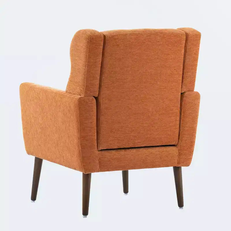 Poltroncina in ciniglia con schienale ergonomico, gambe affusolate in legno e cuscino decorativo, capacità 125 kg