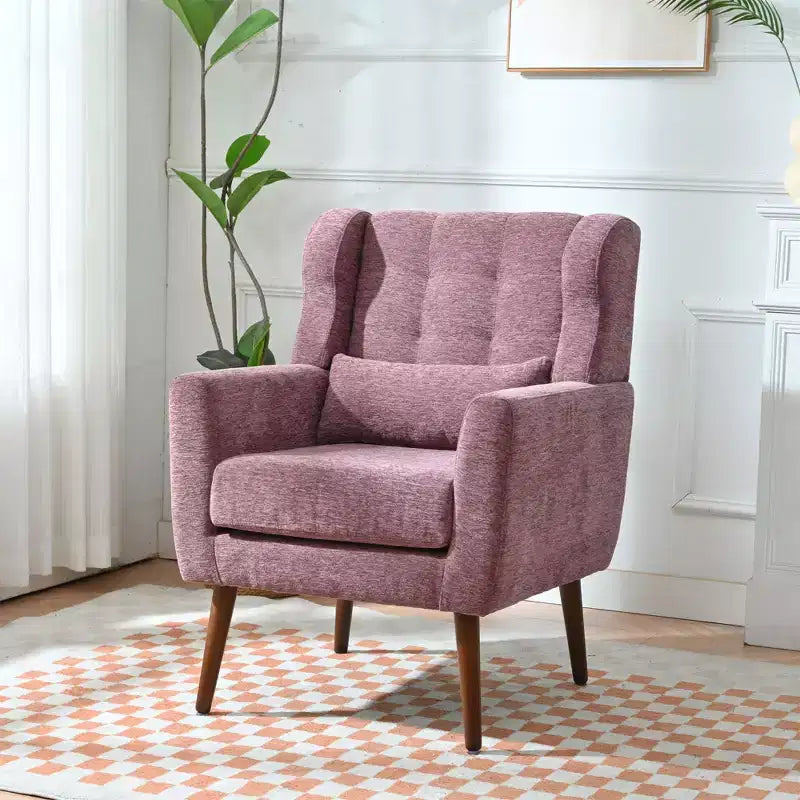 Poltroncina in ciniglia con schienale ergonomico, gambe affusolate in legno e cuscino decorativo, capacità 125 kg