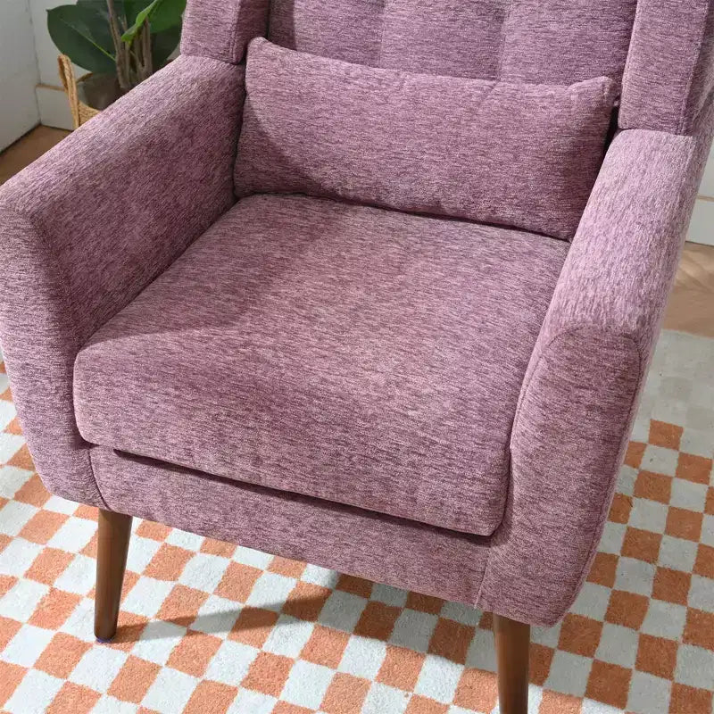 Poltroncina in ciniglia con schienale ergonomico, gambe affusolate in legno e cuscino decorativo, capacità 125 kg