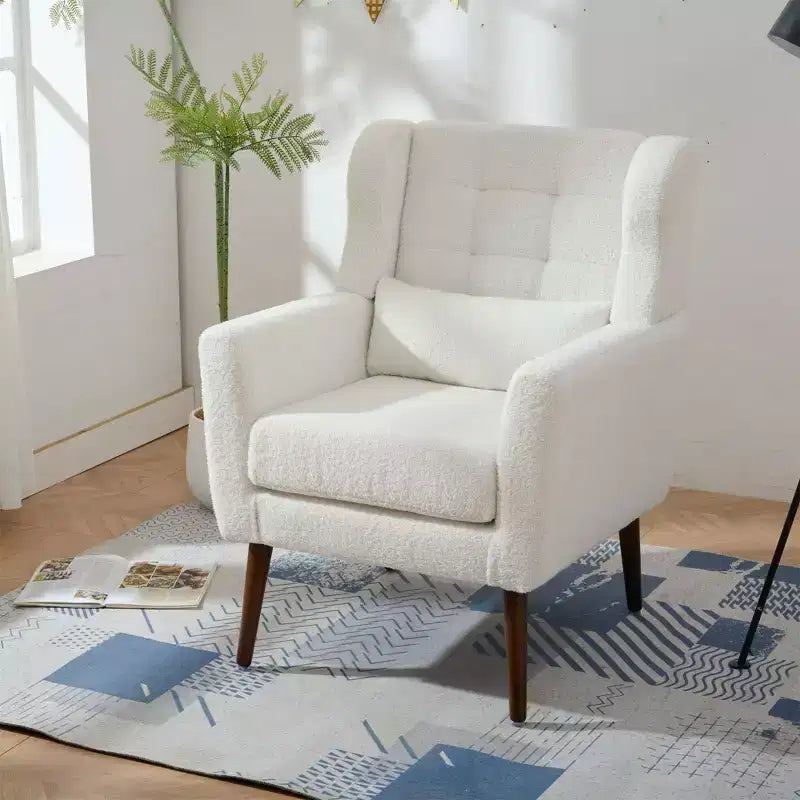 Poltroncina in ciniglia con schienale ergonomico, gambe affusolate in legno e cuscino decorativo, capacità 125 kg