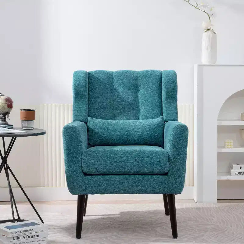 Poltroncina in ciniglia con schienale ergonomico, gambe affusolate in legno e cuscino decorativo, capacità 125 kg