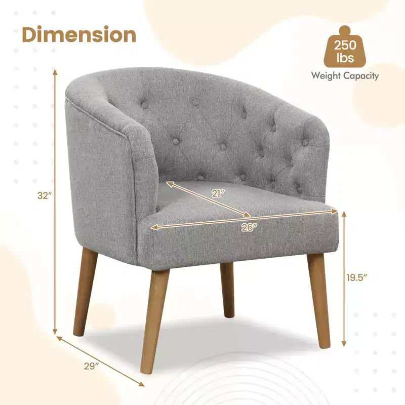 Poltrona imbottita di design con gambe in legno di caucciù